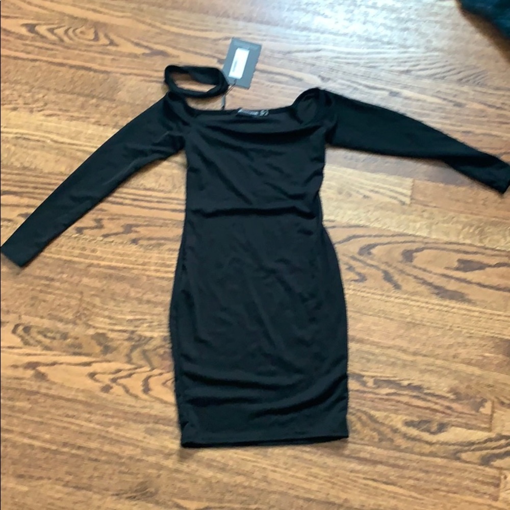 Small tight fitting, black dress